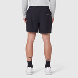 Black Revolutional Training Shorts worn by model, back view