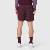 Revolutional Training Short in merlot, rear view on model wearing matching long-sleeve top and socks