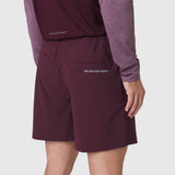 Revolutional Training Short in merlot, back view on model wearing matching long-sleeve top