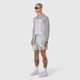 Revolutional Training Short in Sedona Snow Camo worn by model, side view