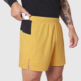 Aerotex™ Distance Run Short in amber yellow worn by model, side view showing pocket detail