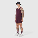 Aerotex Distance Run Short in merlot, modeled with matching socks and white sneakers