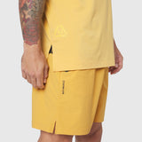 TETRA-LITE® 5" Linerless Training Short in Amber, worn by model, side view