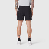 Black TETRA-LITE® 5" linerless training shorts on model, back view