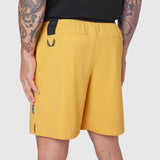TETRA-LITE® 7" Linerless Training Short in amber, worn by model from side view