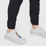 Black TETRA-LITE® Training Jogger worn with white sneakers, cropped leg view