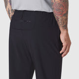 Black TETRA-LITE Training Jogger worn by model, back view showing pocket detail