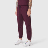 TETRA-LITE® Training Jogger in merlot, worn with white sneakers, front view