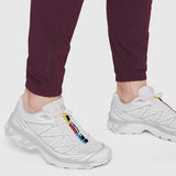 Merlot TETRA-LITE Training Jogger worn with white sneakers, ankle detail view