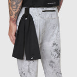 TETRA-LITE Training Jogger in Sedona Snow Camo worn by model, back view with black towel