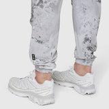 TETRA-LITE Training Jogger in Sedona Snow Camo worn with white sneakers, full length view