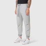 TETRA-LITE Training Jogger in slate grey worn by model, side view