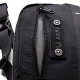 1231 Ripstop Crossbody Bag in black, worn and carried detail view