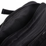 Flatlay 1231 Ripstop Crossbody Bag in black, open interior detail view