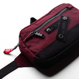 Flatlay 1231 Ripstop Crossbody Bag in Crimson, angled view