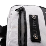1231 Ripstop Crossbody Bag in Slate Grey, detail closeup of zipper and label