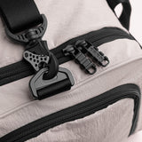 Flatlay 1234 Ripstop Duffle Bag in Chai, detail view of zippers and hardware