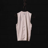 flatlay SM'22 Outlast® Base Layer Cutoff sleeveless shirt in cream, back view