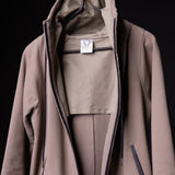 WN'17 Zip Hoodie in mauve, worn open to show interior lining and construction details