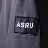 SP'20 Garment-Dyed Patch Hoodie in charcoal gray, sleeve detail closeup