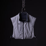 SP'22 Reversible Run Vest in grey and black, displayed on hanger against dark background