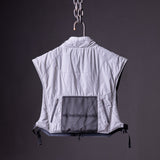 flatlay SP'22 Reversible Run Vest in light grey and black, back view hanging from chain