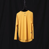 SM'24 Established Long Sleeve in golden yellow, displayed on hanger against dark background