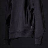 WN'23 Panel Quarter Zip Jacket in black, detail view of side seam and zipper pocket