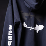Koi Graphic Hoodie in navy, worn showing white koi fish design and sleeve text
