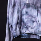 SM'22 Tie Dye Hoodie in purple tie dye, displayed on model showing front and side view