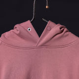 Tech Terry Eagle Hoodie in mauve pink, close-up of collar and drawstring detail