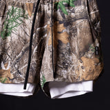 Flatlay of FA'23 5" Liner Short in realtree camo with white liner, front view