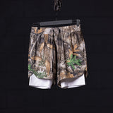 Flatlay of FA'23 7" Liner Short in camo with white liner, hanging view