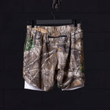 flatlay FA'23 7" Liner Short in realtree camo with white liner, back view