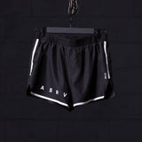 flatlay ASRV Reflective 3" Run Short in black with white trim, front view on hanger