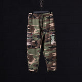flatlay SP'23 Cinch Cargo Jogger in woodland camouflage, front view