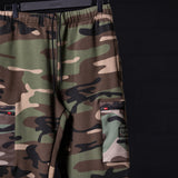 SP'23 Cinch Cargo Jogger in camouflage pattern, worn on model, detail shot