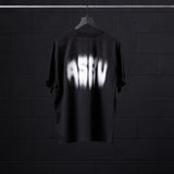 Black Tech Essential Relaxed Tee with Motion Blur design on hanger, back view