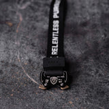 Flatlay of WN'20 Cobra Buckle Bracelet in black with Relentless strap, detail view