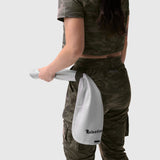 Tetra-Lite® Cargo High Rib Jogger in dark camo, worn with white towel accessory
