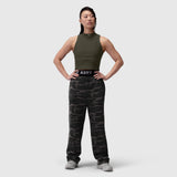 Lycra Ribbed Mockneck Tank in olive worn with camouflage joggers, front pose