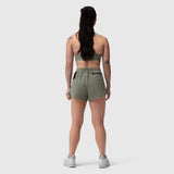 Tetra-Lite Linerless Short in sage, rear view on model