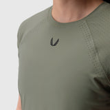 Laser-Vent Established Tee in sage worn by model, front view showing perforated fabric detail