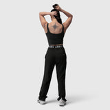 Black LYCRA® 2-in-1 tank top worn by model from back, showing compass tattoo