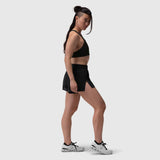 Aerotex Side Split Run Short in black, worn by model in side profile stance