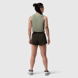 AeroSilver Tank Top in sage worn with black shorts, back view on model