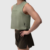 AeroSilver Tank Top in sage green worn by model with dark shorts, side view