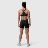 Black Lycra Hybrid Sports Bra with cross-back straps, worn by model from back view