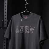 ASRV Tech Essential Relaxed Tee in black with white outline logo, displayed on hanger