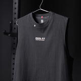 Black Tech Essential Relaxed Cutoff tank top on hanger with 'Relentless Pursuit' text design